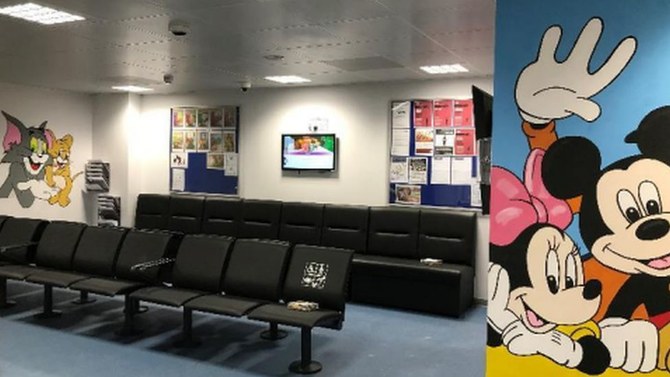 UK immigration minister orders removal of cartoon murals at children asylum seeker center