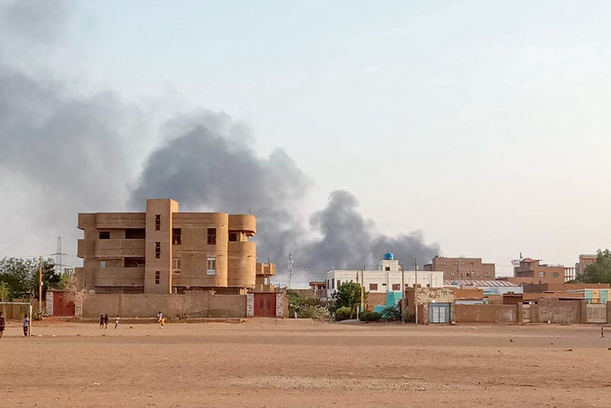 Smoke billows in the distance around the Khartoum Bahri district amid ongoing fighting on July 14, 2023. (AFP)