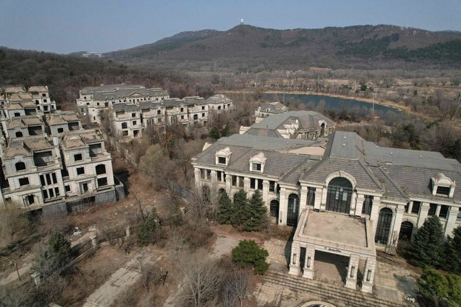 Chinese ghost town of mansions reclaimed by farmers