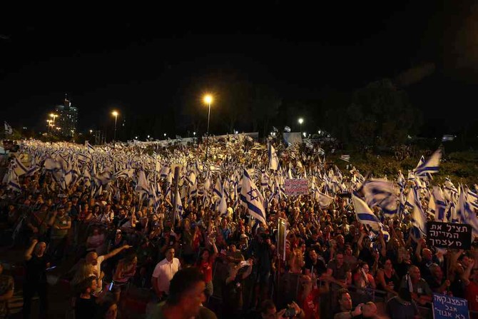 Thousands march in Israel as former officials beg Netanyahu to halt judicial overhaul