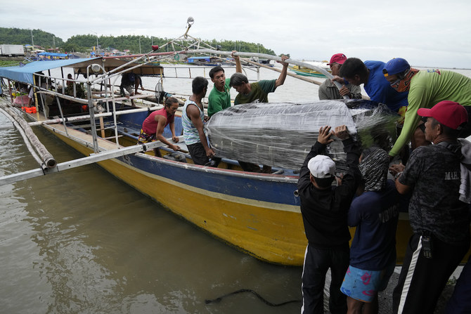 Philippine coast guard chief: Ferry was overloaded when it flipped over, leaving 27 dead