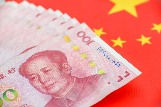 China’s yuan hits over 9-month low on weak economy 