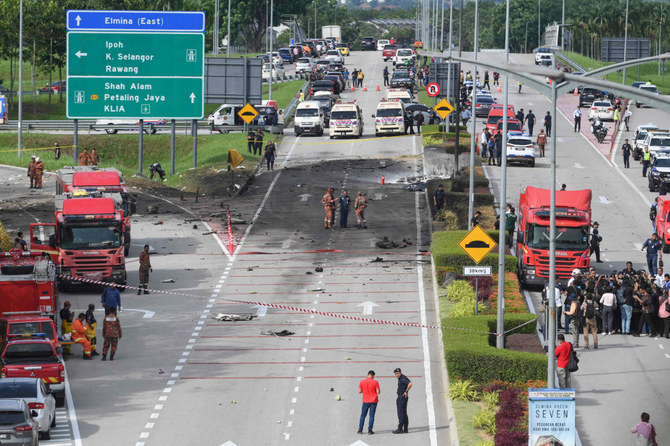 Plane crashes into highway near Malaysian capital, killing 10