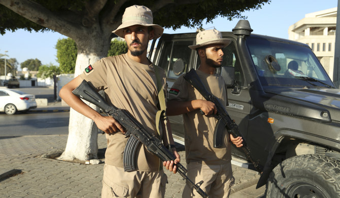 Libyan security forces stand guard in Tripoli, Libya, Tuesday, Aug. 16, 2023. (AP)