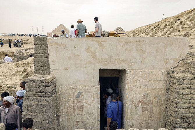 People visit a newly discovered ancient tomb in the Saqqara necropolis south of Cairo. (File/AFP)