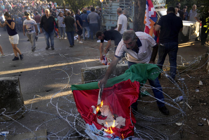 Lebanese Armenians scuffle with riot police during protest outside Azerbaijan embassy