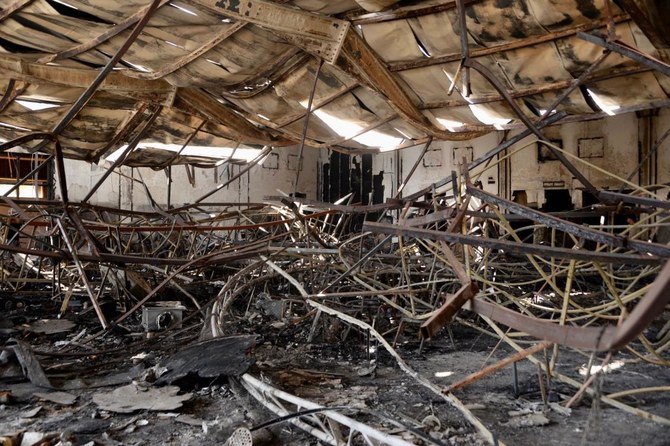 This image shows the devastated interior of Al-Haitham hall in Qaraqosh, also known as Hamdaniyah.