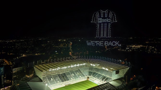 Front-of-shirt sponsor celebrates return of European nights by lighting up the skies. Credit: Owen Humphreys/PA Wire