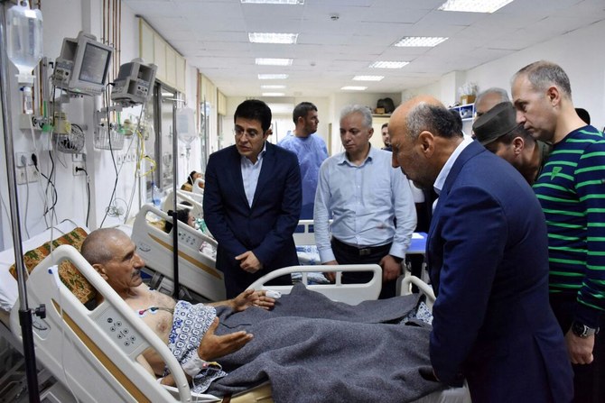 Syria’s health minister visits injured individuals in the aftermath of a drone attack targeting Syrian military academy in Homs.