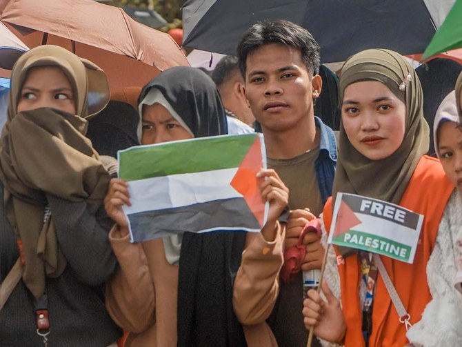 ‘Their pain is our pain’: Filipinos in Marawi protest in solidarity with Gaza