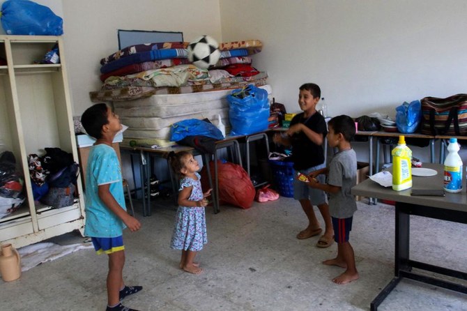 Children from Beit Leef village play footall in a classroom of a school where displaced Lebanese families are sheltering. 