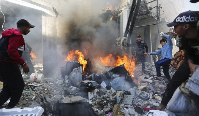 Palestinians look for survivors after an Israeli strike on Rafah, Gaza Strip, Friday, Nov. 17, 2023. (AP)