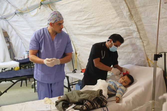 Doctors treat patients at a Jordanian military field hospital in the besieged Gaza Strip. (Supplied)