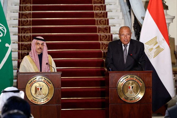 Egypt’s Foreign Minister Sameh Shoukry and his Saudi counterpart Prince Faisal bin Farhan give a press conference in Cairo.