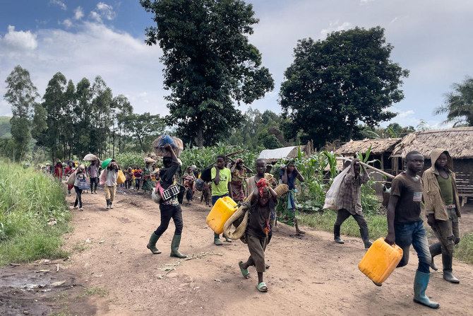 Militants in eastern Congo kill 12 villagers as country’s leader rules out talks with Rwanda