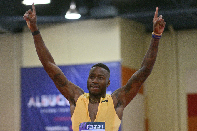 Holloway blasts to hurdles world record at US Indoors