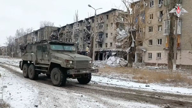 Ukrainian soldiers expect more assaults after Russian forces capture eastern town