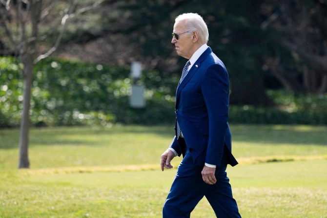 US President Joe Biden walks to Marine One. (AFP)