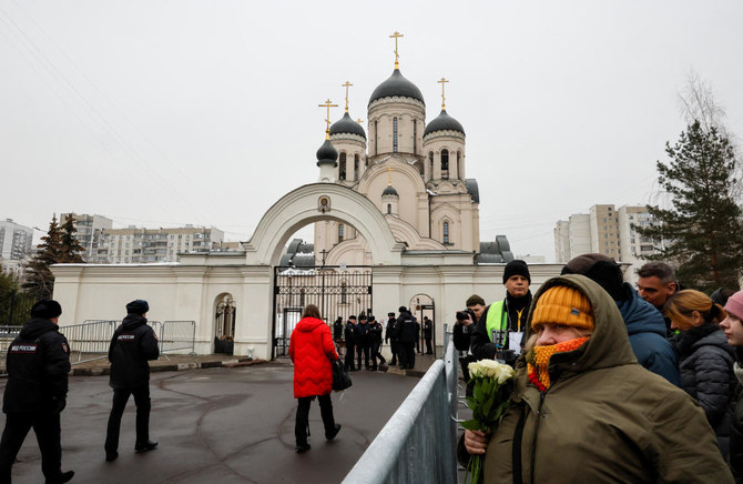 Thousands attend as Navalny laid to rest in Moscow