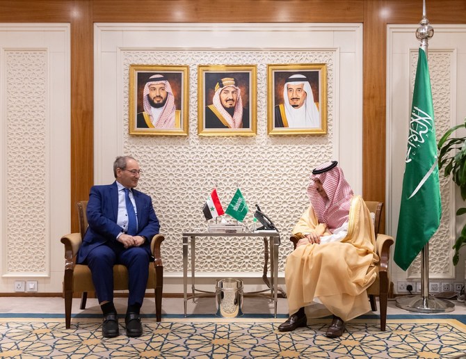 Saudi Foreign Minister Prince Faisal bin Farhan receives his Syrian counterpart Faisal Mekdad in Riyadh on Thursday. (SPA)