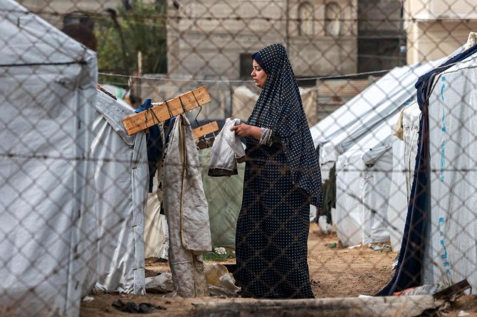 Rafah displaced shiver as thunder and rain lash tent camp