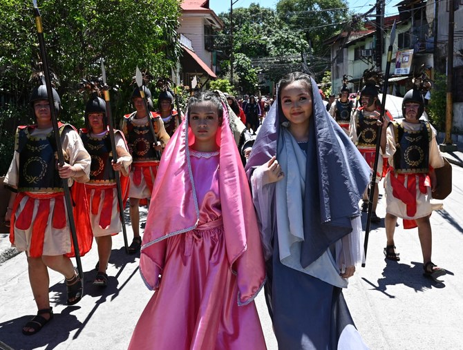 Marathon singing, vigils and pre-dawn processions as Filipinos celebrate Holy Week