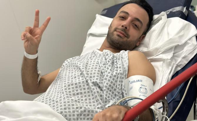 Iranian journalist posts defiant update from hospital bed after knife attack outside London home