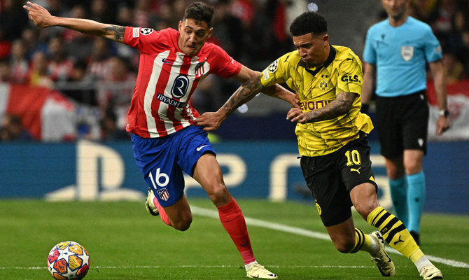 Atletico hold on to keep advantage on Dortmund