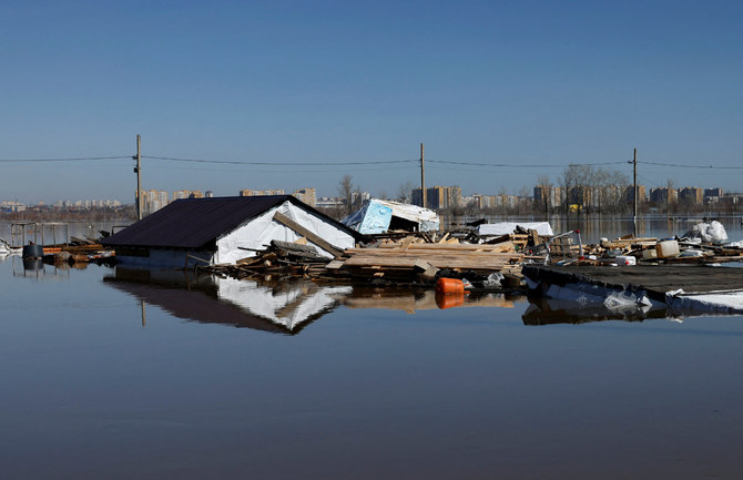 Rapidly rising flood waters force mass evacuations in Russian, Kazakhstan border towns