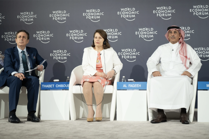 Abdulrahman Al-Fageeh (R), CEO of the Saudi Basic Industries Corporation.