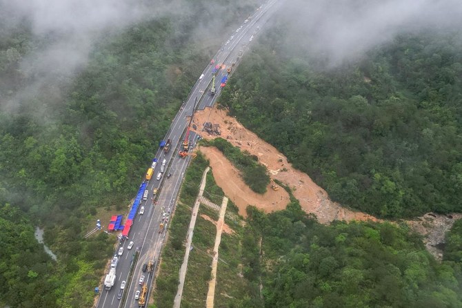 A Chinese driver is praised for helping reduce casualties in a highway collapse that killed 48