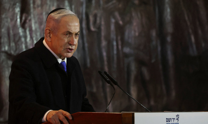 Netanyahu uses Holocaust ceremony to brush off international pressure against Gaza offensive