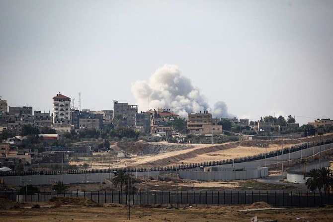 Israeli forces push into Gaza from north and south