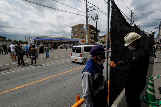 Swarmed with tourists, Japan town blocks off viral view of Mt. Fuji