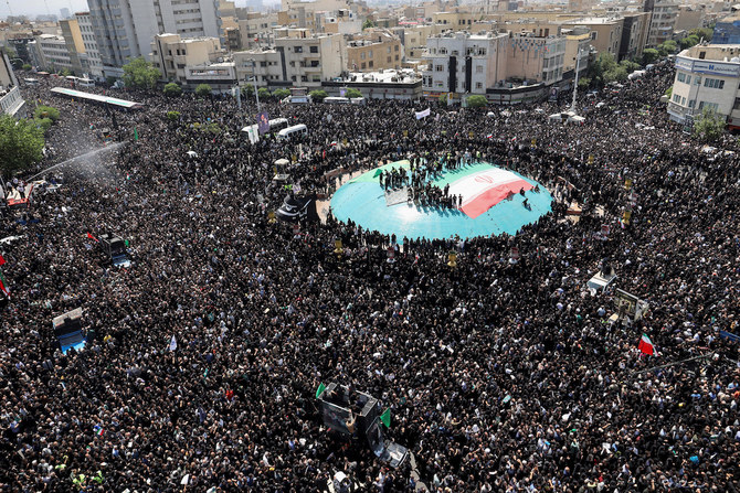 Huge crowds in Iran capital for Raisi’s funeral