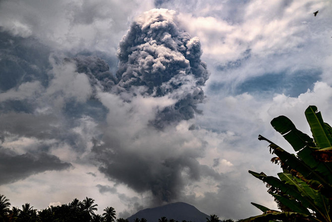 Indonesia’s Mt Ibu volcano erupts, spewing clouds of ash