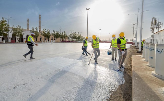 Namira Mosque walkways cooled with white coating 