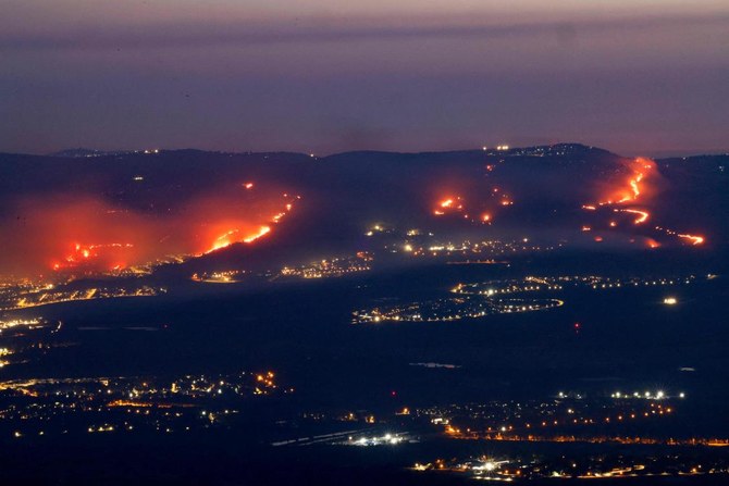 Brush fires sparked by rockets from Lebanon blaze in north Israel