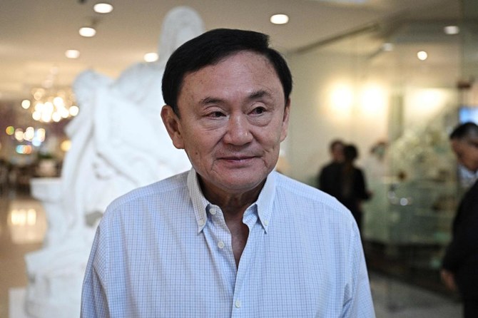 Thai ex-PM Thaksin says ready to face royal insult charges