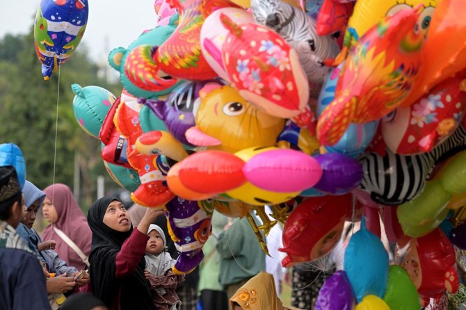 Muslims in Asia celebrate Eid Al-Adha with sacrifice festival and traditional feast