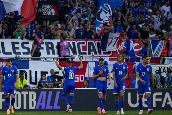 Kylian Mbappé scores on return from broken nose as France draw 1-1 with Poland at Euro 2024