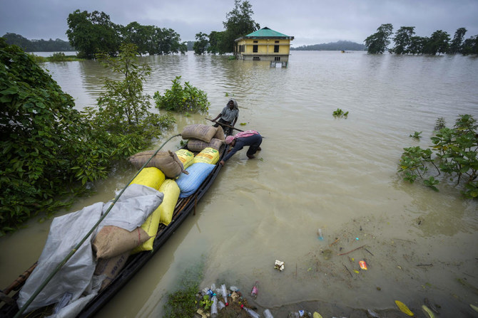 Floods and landslides triggered by heavy rains in India’s northeast kill at least 16 people