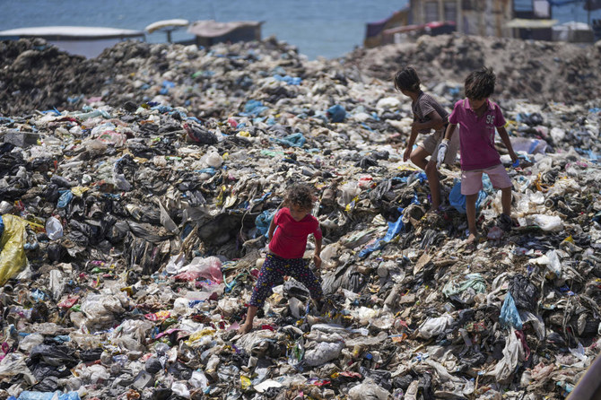 Huge mounds of rotting trash pile up around Gaza camps, UNRWA says