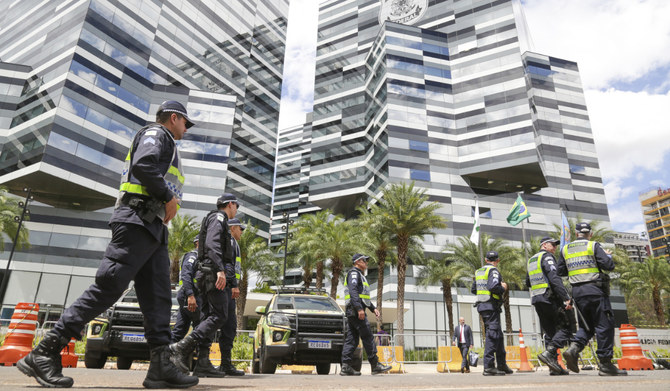 Police walk outside Federal Police headquarters in Brasilia, Brazil, Wednesday, April 5, 2023. (AP)