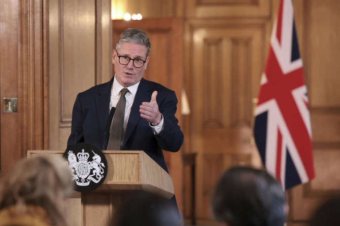British Prime Minister Keir Starmer delivers a speech, following his first cabinet meeting as Prime Minister, in London.