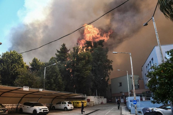 Hospital evacuated after wildfire breaks out in Greece