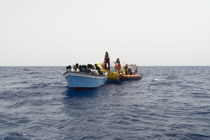 Armed bandits interrupt a rescue of migrants in the Mediterranean off Libya, an aid group says