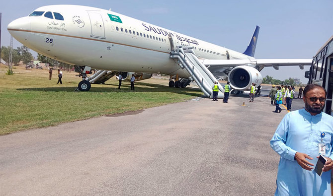 Saudi Airlines flight’s landing gear catches fire at Peshawar airport, prompting emergency response