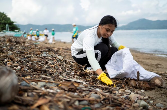 Philippine diving town trades plastic for rice to tackle ocean waste