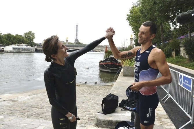 French sports minister takes a dip in the Seine ahead of Paris Olympics